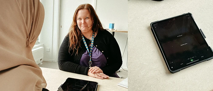 Socialsekreterare Emma Lindström testar den digitala tolken.